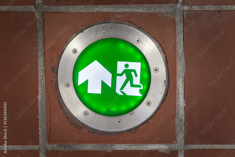 Emergency exit light on the ground or foot path. Emergency exit light on the ground or foot path.