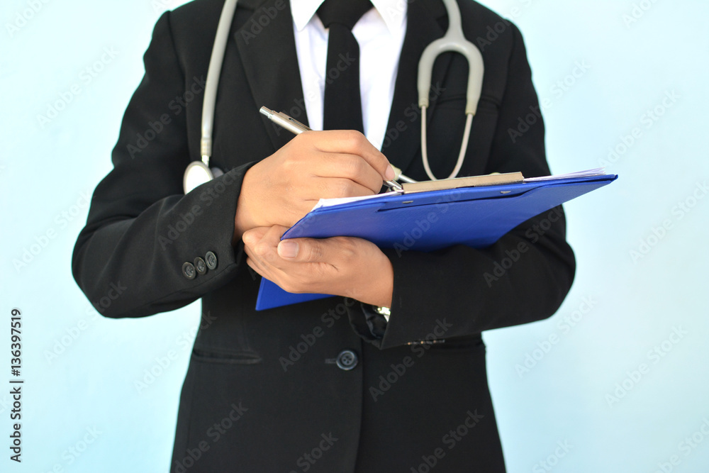 Women doctor working , selective of focus and blue background Women doctor working , selective of focus and blue background
