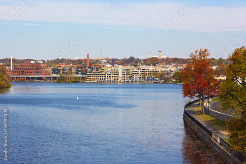 Potomac River waterfront near Georgetown Park, Washington DC, USA. Autumn in US capital suburb near the river.