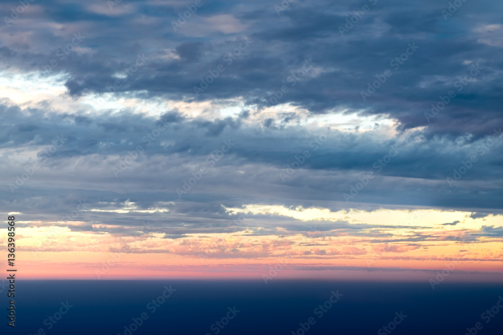 View sunset with sky and cloudy from airplane window when flying