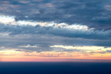 View sunset with sky and cloudy from airplane window when flying
