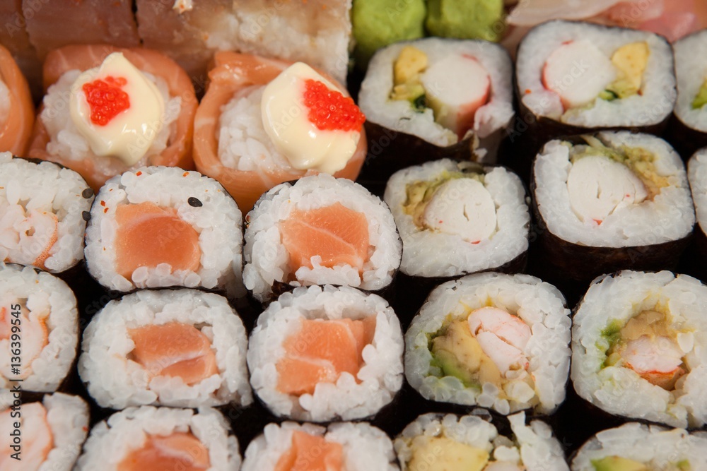 Set of assorted sushi kept in a black box Set of assorted sushi kept in a black box