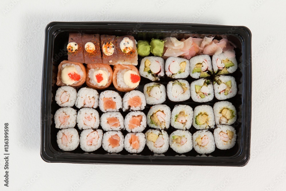 Set of assorted sushi kept in a black box Set of assorted sushi kept in a black box