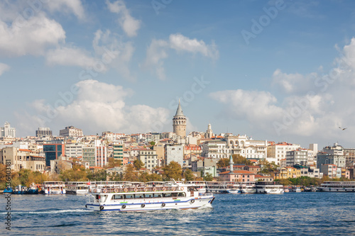 Sunny view of Bosphorus with excursion boats and Galata Tower, Istanbul, Turkey. © Neonyn