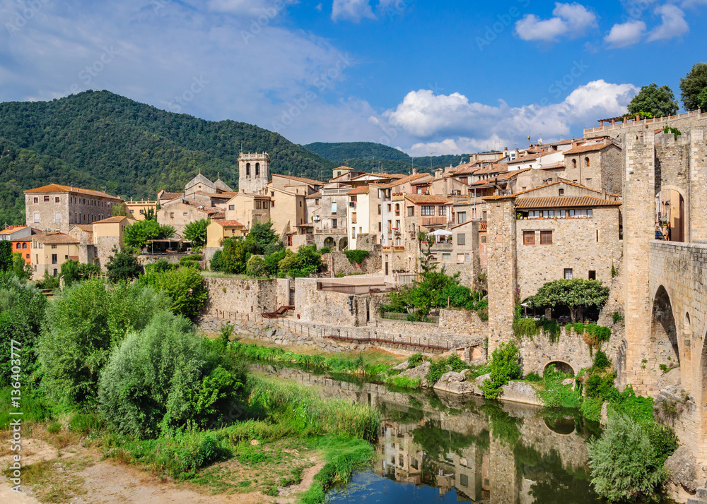 View of the historic Catalan city of Besalú from the moat and w