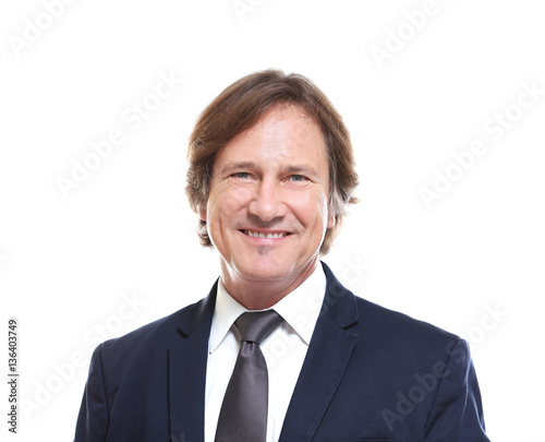 Confident man in suit on wh...