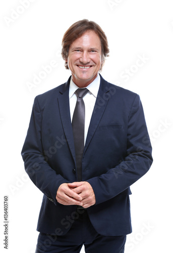 Confident man in suit on wh...