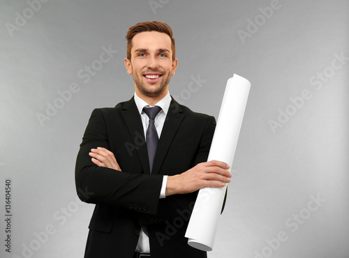 Handsome engineer with draw...