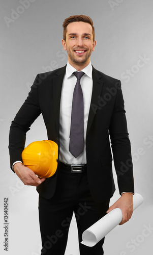 Handsome engineer with draw...