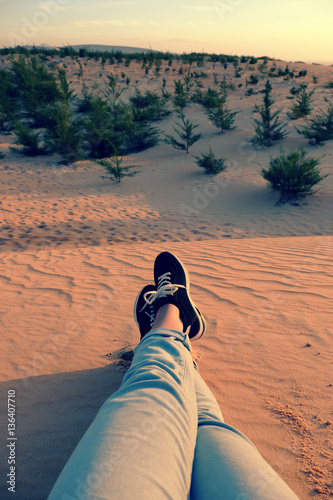 summer is coming, woman foot on sand hill