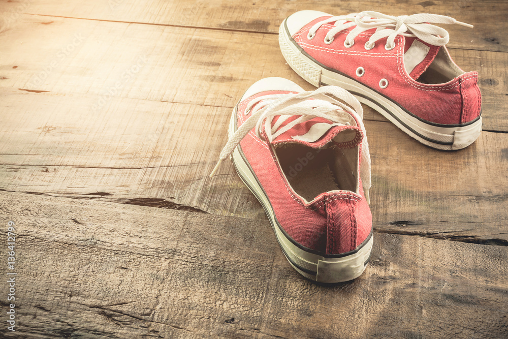 red shoes on  wood background