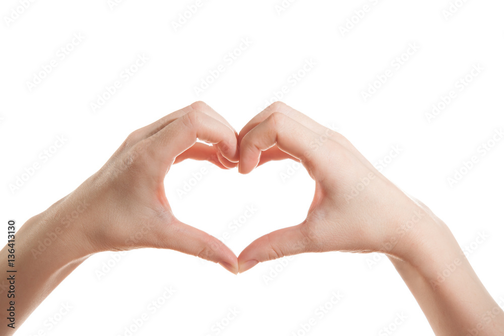 Fototapeta premium Female hand showing thumbs heart