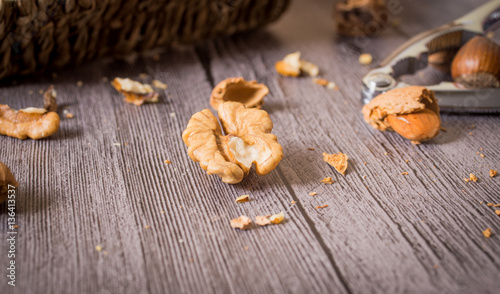 Delicious assortment of nuts on wooden background