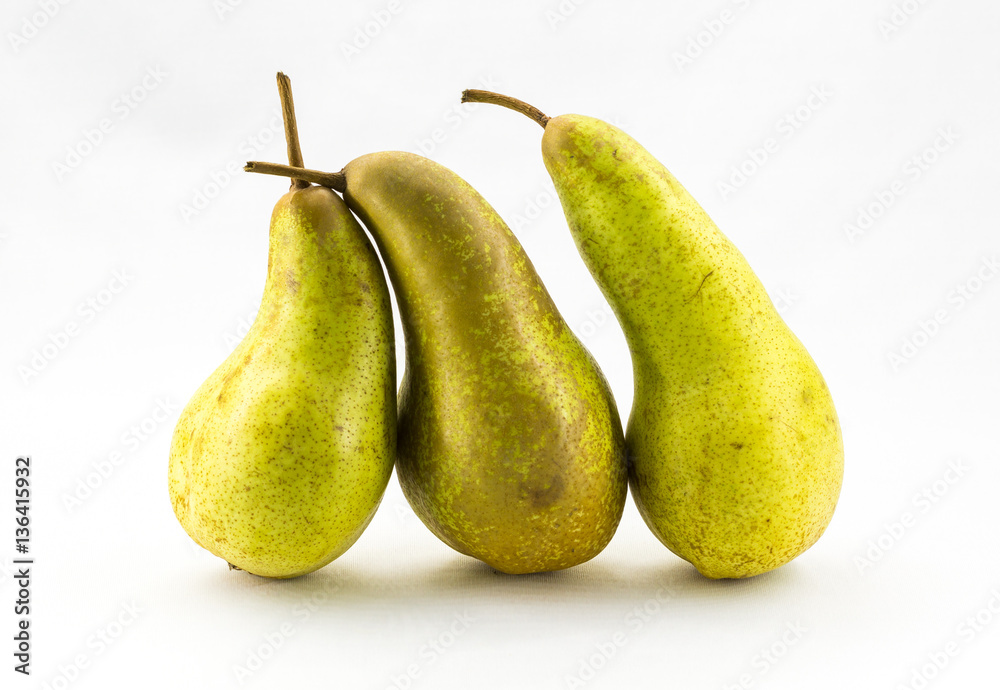 Three Abate Fetel pears isolated on white background. Three Abate Fetel pears isolated on white background.