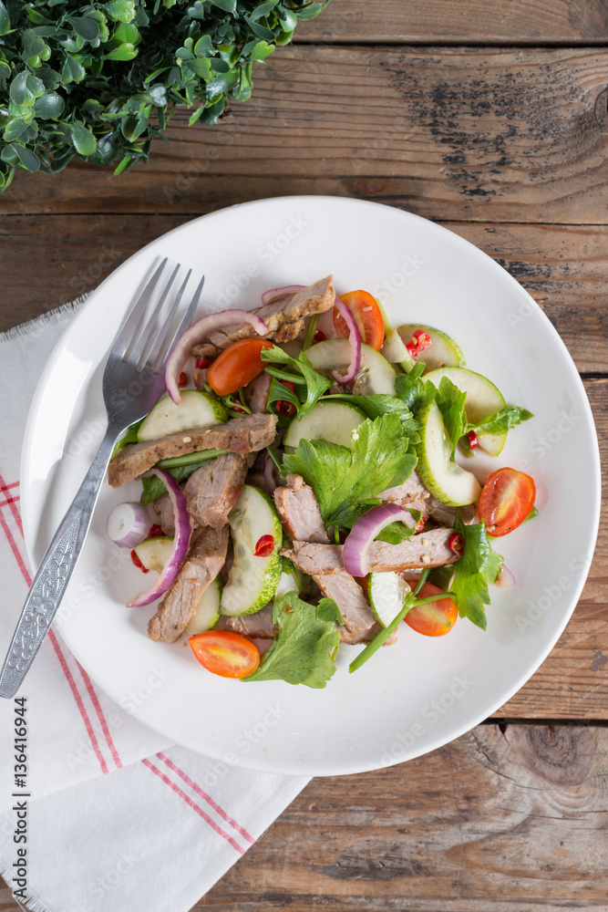 Spicy salad of grilled beef, Thai style food.