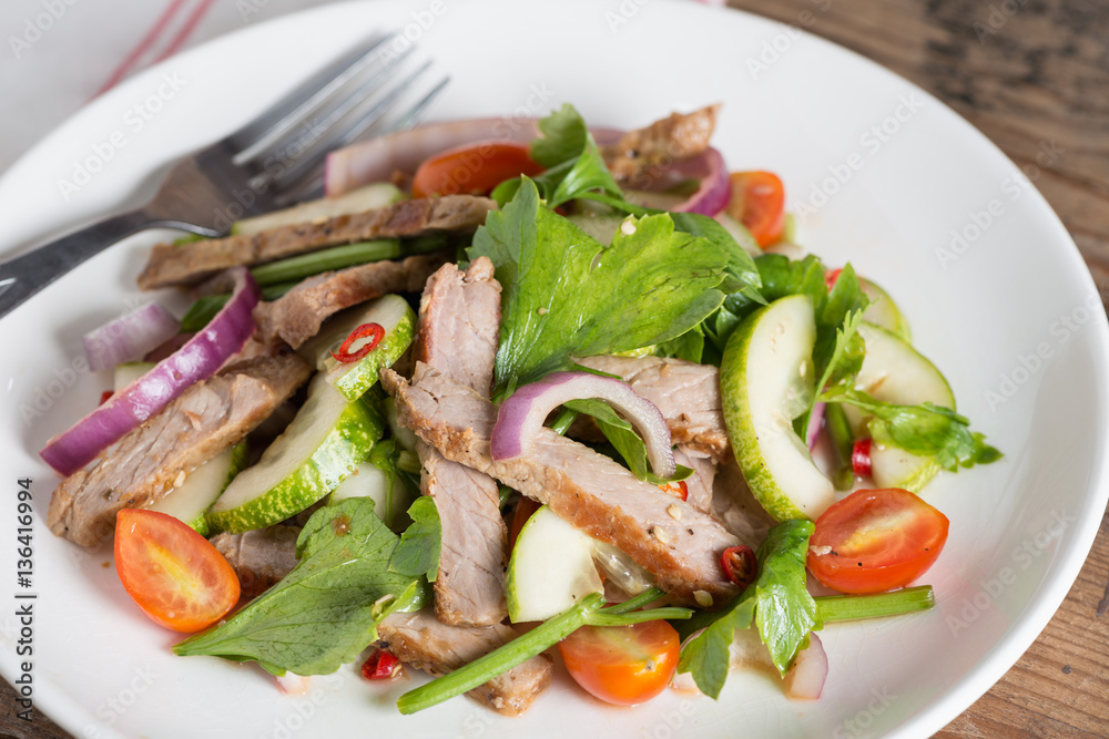 Close up, Spicy salad of grilled beef. Thai style food. Close up, Spicy salad of grilled beef. Thai style food.