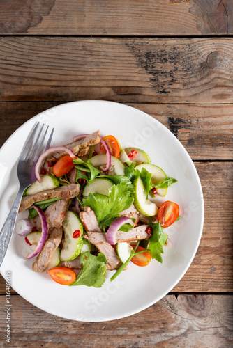 Spicy salad of grilled beef, Thai style food.