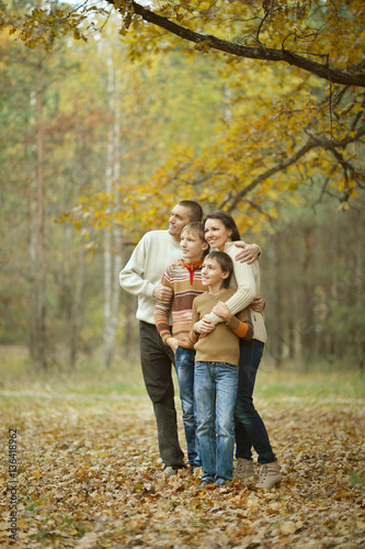  Family of four in autumn 