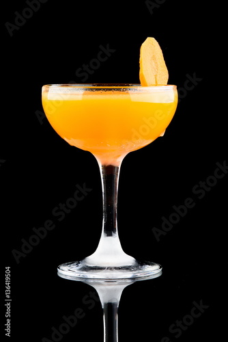 coctail with carrot on black background photo