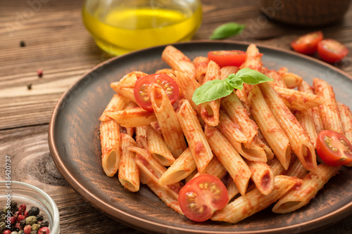 Penne with tomato sauce, basil and tomatoes