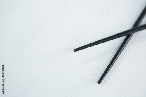 Chopsticks on a white background