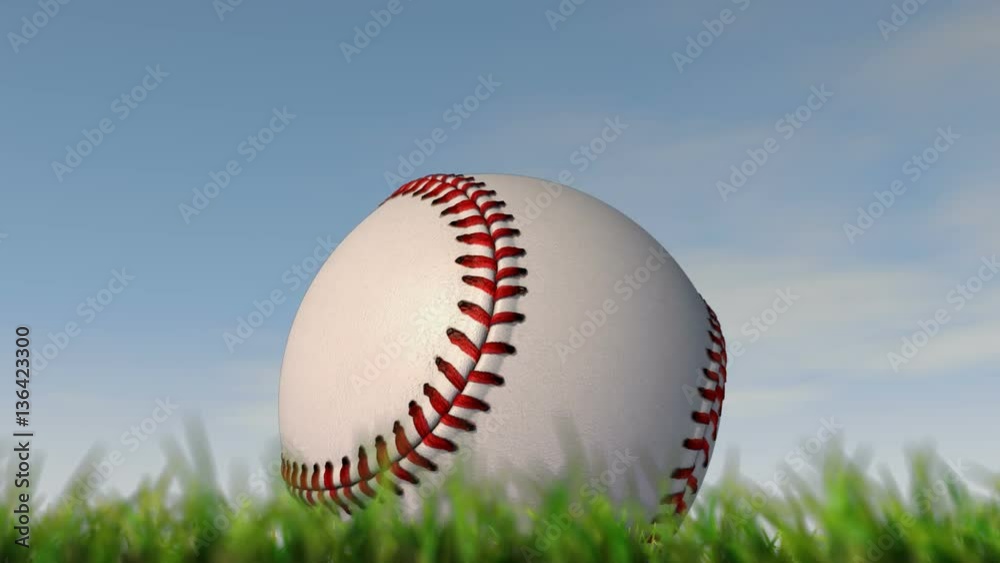 A static shallow depth of focus time lapse over a day of a baseball ball in the grass on a cloudy blue sky background - 3D render A static shallow depth of focus time lapse over a day of a baseball ball in the grass on a cloudy blue sky background - 3D render