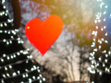 Red heart. holiday symbol of love Valentine's Day. Background blur bokeh illumination