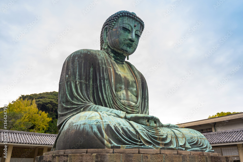 Monumental bronze statue of the Great Buddha in Kamakura, Japan. Monumental bronze statue of the Great Buddha in Kamakura, Japan.