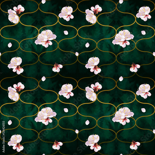 Trendy seamless vector pattern with spring blossom mood. Tony gold waves shapes with plum tree flowers and petals on emerald velvet textured background.