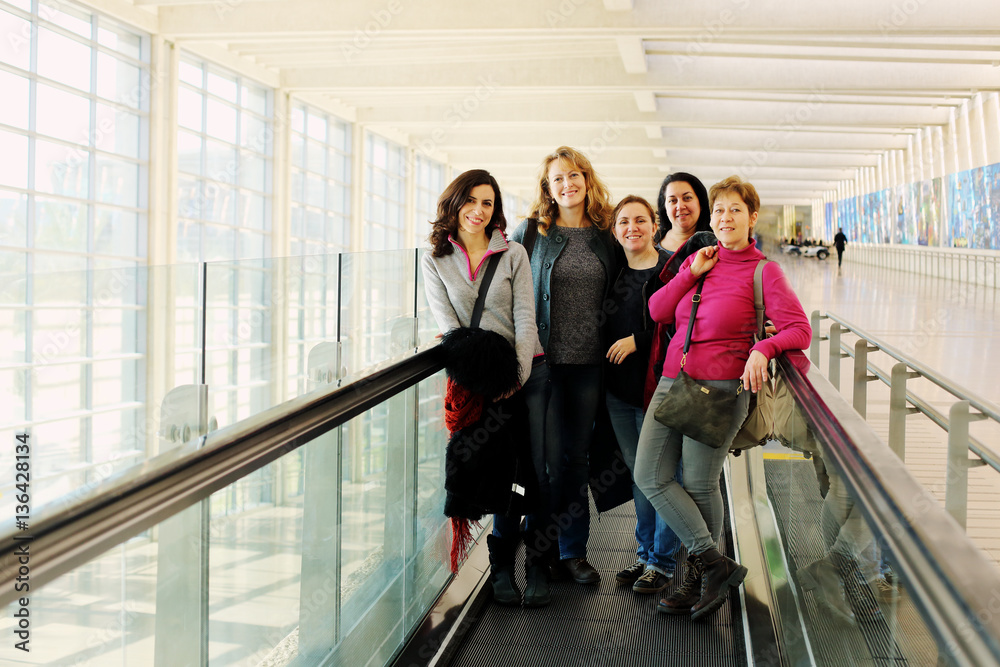 Portrait of beautiful five friends traveling together Portrait of beautiful five friends traveling together