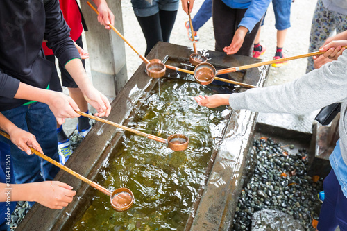 фотографія Water purification at entrance of the Japanese temple