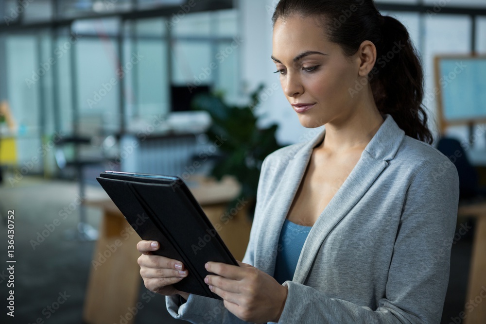 Businesswoman using digital tablet Businesswoman using digital tablet