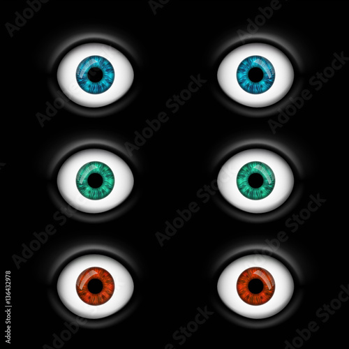 Set of human eyes with multicolored iris. Isolated on a black ba
