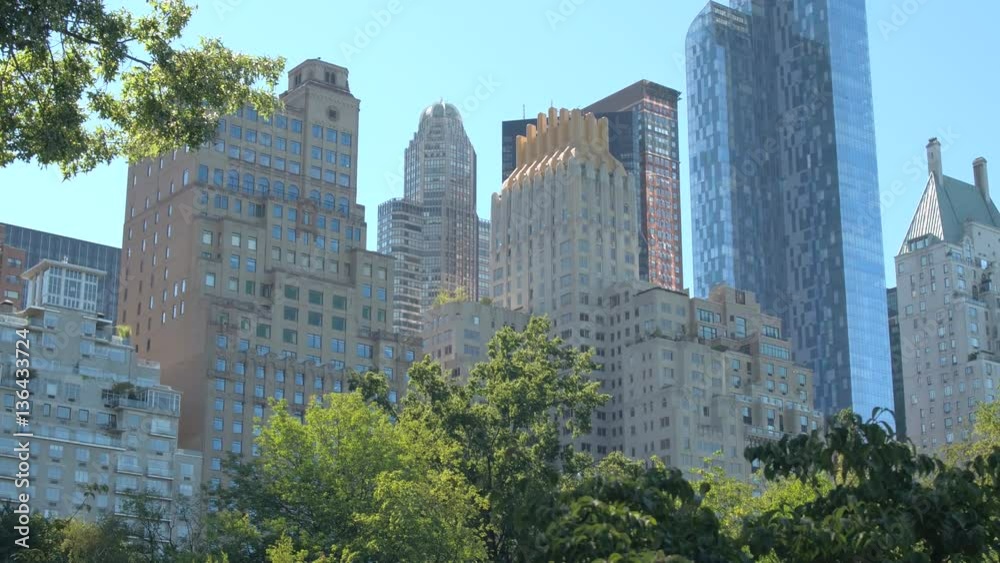 CLOSE UP: Tall glassy skyscrapers and luxury residential buildings in NY City CLOSE UP: Tall glassy skyscrapers and luxury residential buildings in NY City