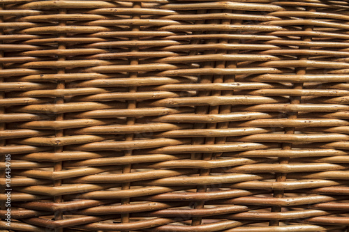 Wicker basket in close up. Background pattern. Rustic natural material.