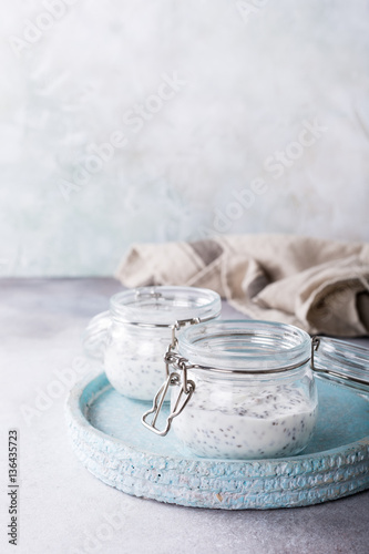 Chia seed pudding in glass jar. Superfoods concept with copy space.