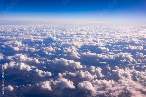  Clouds viewed from an airplane. sky with clouds. © EwaStudio