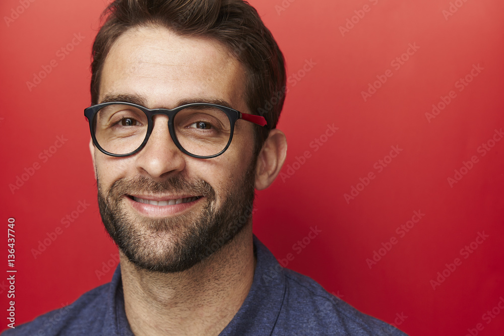 Confident man smiling in spectacles, portrait Confident man smiling in spectacles, portrait