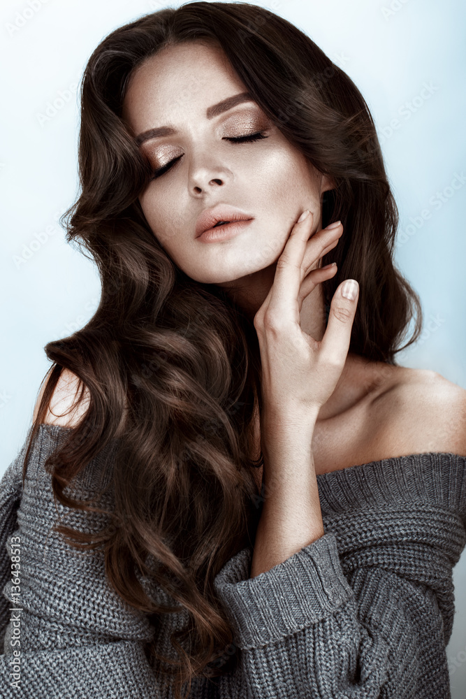 Beautiful woman with healthy skin and hair curls, posing in studio. Beauty face Beautiful woman with healthy skin and hair curls, posing in studio. Beauty face