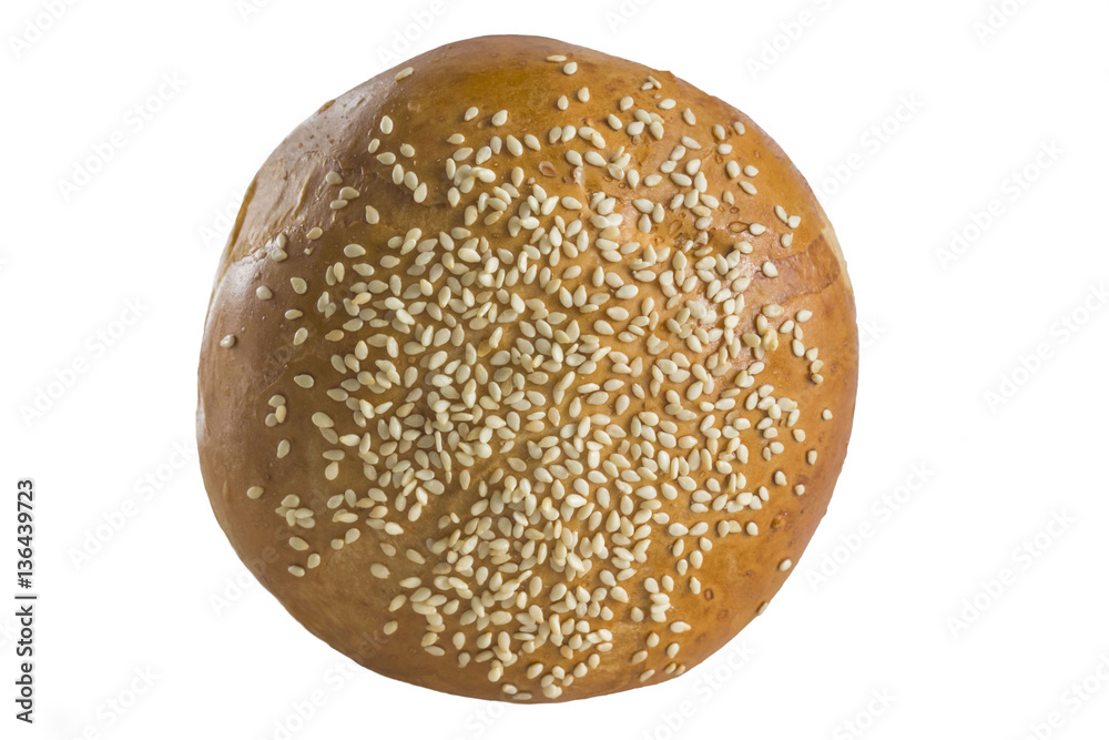 a bun topped with sesame seeds on top a bun topped with sesame seeds on top
