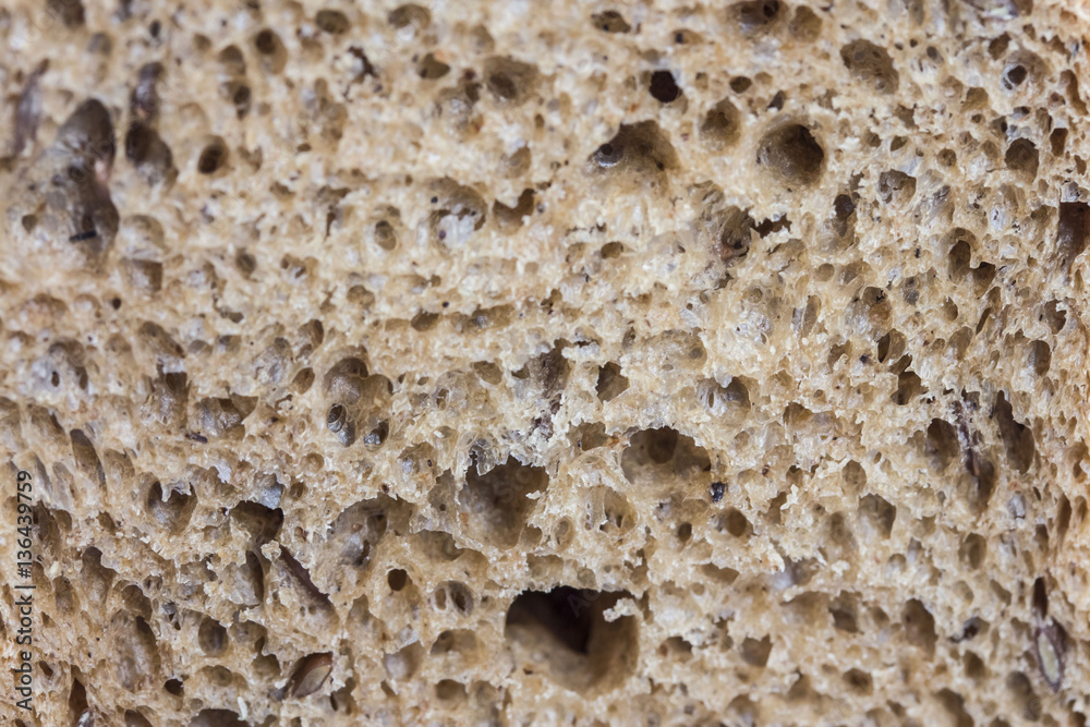 dark rough porous fresh bread close dark rough porous fresh bread close