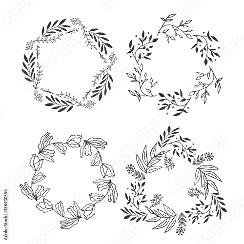 Set of floral vine wreaths. Hand drawn vector illustration. Flowers and laurels doodle.