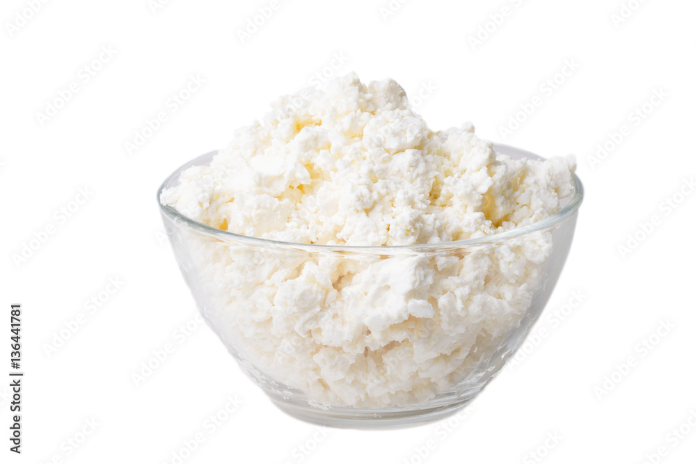 sweet fresh loose sour milk cheese in a glass bowl sweet fresh loose sour milk cheese in a glass bowl