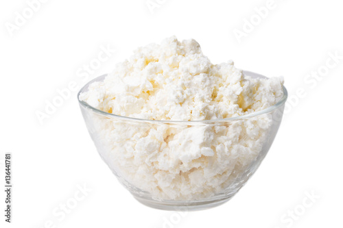 sweet fresh loose sour milk cheese in a glass bowl