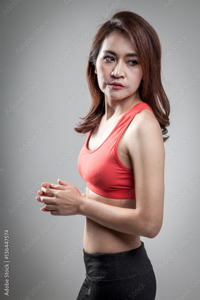 Asian strong healthy girl with muscular body Asian strong healthy girl with muscular body
