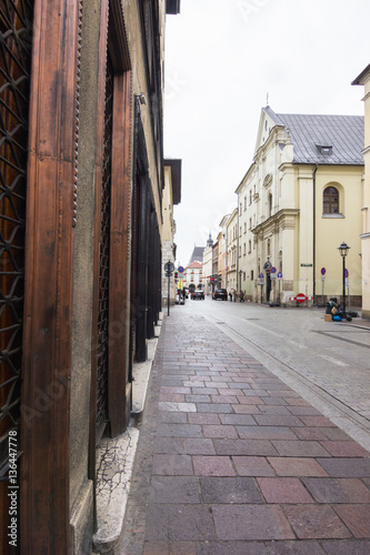 Architecture of streets of Krakow, Poland town in rainy day