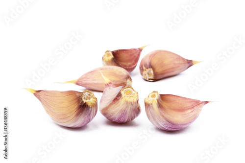 Healthy fresh garlic cloves isolated on white background