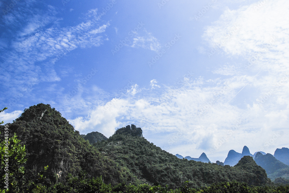 The mountains and countryside scenery with blue sky