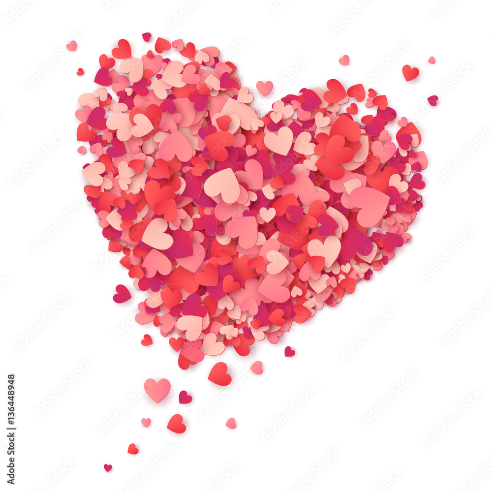 Flying heart made from pink and red confetti on white background Flying heart made from pink and red confetti on white background