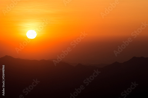 Sunset at the Mountain Hill,Beautiful sunlight, Orange lights background